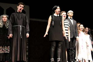 The cast of “The Addams Family” performs at a dress rehearsal in preparation for its annual spring musical. The costumes were kept close to the iconic characters’ identities, with details that make them individual to FYP’s production.   
