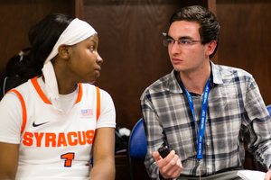 Paul Schwedelson, an assistant sports editor at The D.O., interviews Syracuse women's basketball player Alexis Peterson. 