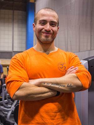 Chris Arboleda, a second year graduate student studying exercise science, is a full-time student in addition to working as a personal trainer and being a member of the Syracuse University cheerleading team.